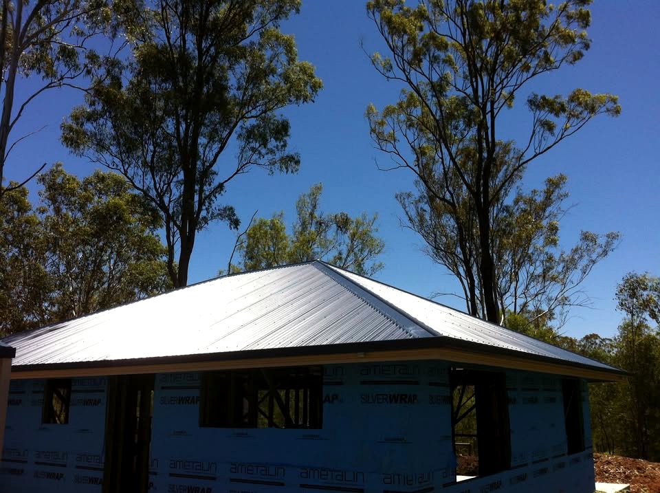 Clean installed Colorbond roofline and gutter line on a new Ipswich home