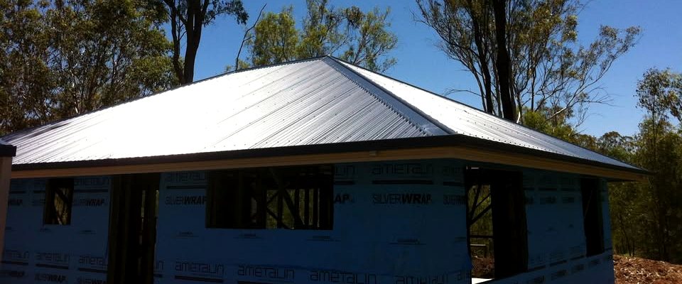 Finished metal roofline with neat eave and gutter line